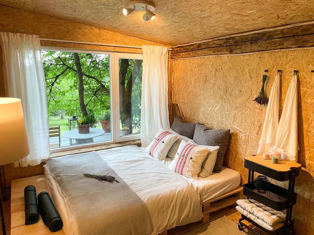Bed in the corner window